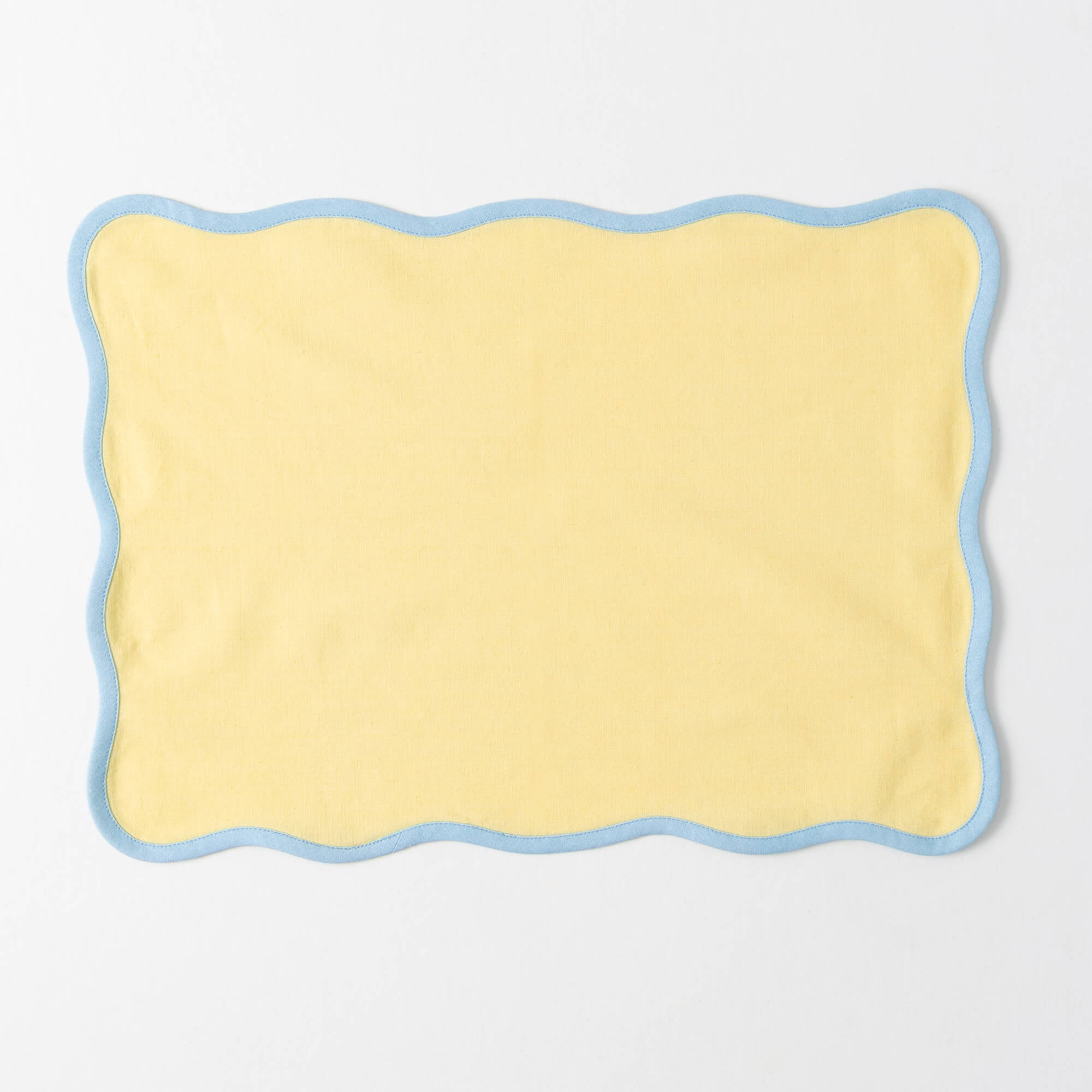 SCALLOPED PLACEMAT