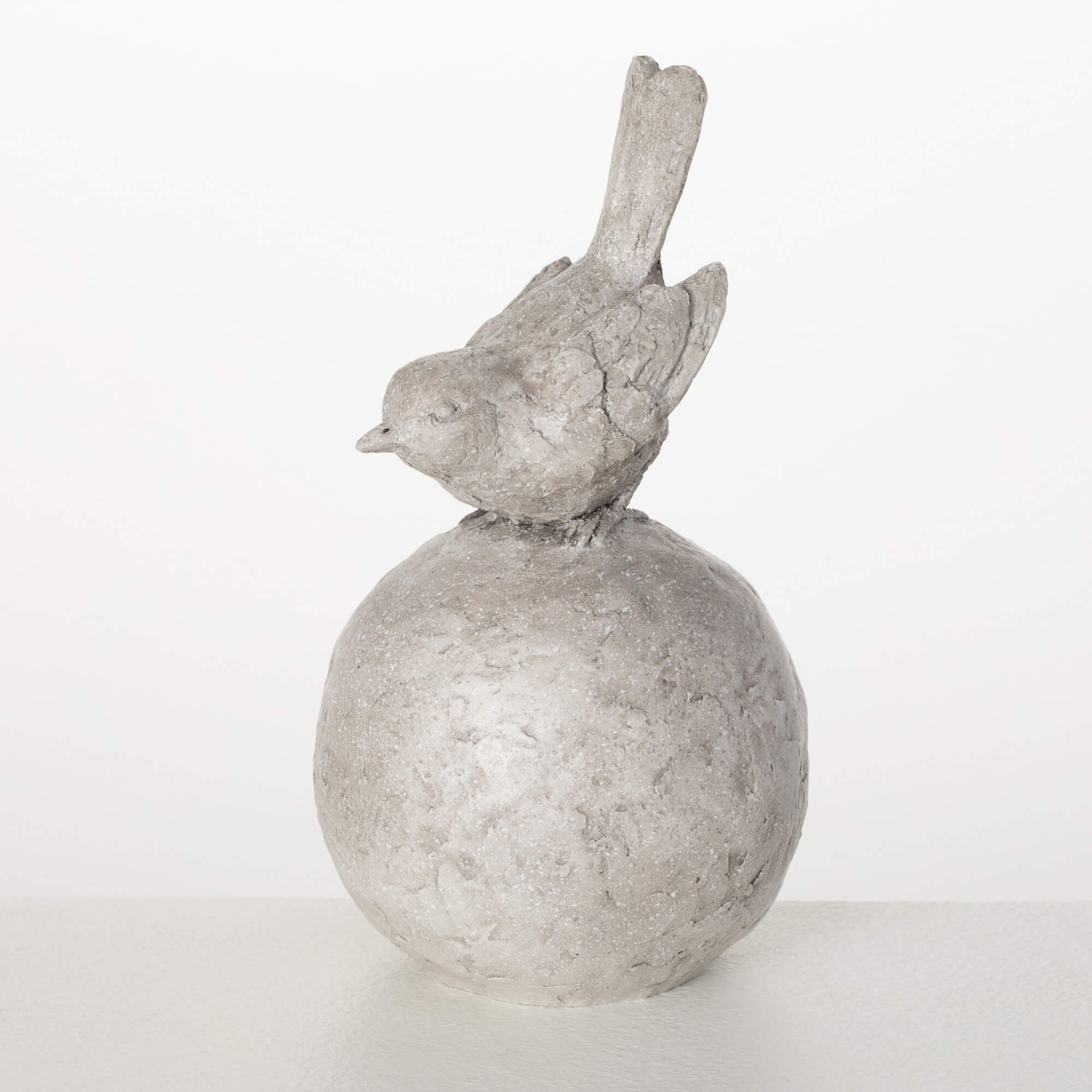 BIRD ON BALL